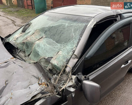 Серый Киа Рио, объемом двигателя 1.4 л и пробегом 250 тыс. км за 1950 $, фото 11 на Automoto.ua