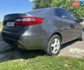 Серый Киа Рио, объемом двигателя 1.6 л и пробегом 250 тыс. км за 8299 $, фото 5 на Automoto.ua