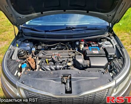 Серый Киа Рио, объемом двигателя 1.4 л и пробегом 235 тыс. км за 5600 $, фото 9 на Automoto.ua