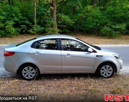 Сірий Кіа Ріо, об'ємом двигуна 1.4 л та пробігом 230 тис. км за 5750 $, фото 1 на Automoto.ua