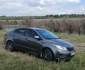 Сірий Кіа Ріо, об'ємом двигуна 1.4 л та пробігом 218 тис. км за 5800 $, фото 4 на Automoto.ua