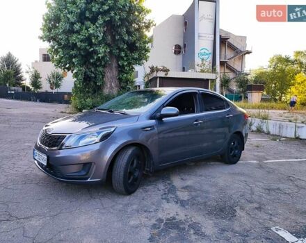 Серый Киа Рио, объемом двигателя 1.4 л и пробегом 225 тыс. км за 5200 $, фото 1 на Automoto.ua