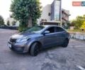 Серый Киа Рио, объемом двигателя 1.4 л и пробегом 225 тыс. км за 5200 $, фото 1 на Automoto.ua
