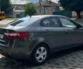 Сірий Кіа Ріо, об'ємом двигуна 1.4 л та пробігом 250 тис. км за 6495 $, фото 13 на Automoto.ua