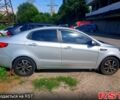 Серый Киа Рио, объемом двигателя 1.4 л и пробегом 145 тыс. км за 8210 $, фото 1 на Automoto.ua