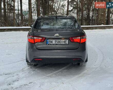 Серый Киа Рио, объемом двигателя 1.4 л и пробегом 260 тыс. км за 7799 $, фото 3 на Automoto.ua