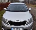 Серый Киа Рио, объемом двигателя 1.4 л и пробегом 240 тыс. км за 7030 $, фото 3 на Automoto.ua
