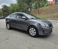Серый Киа Рио, объемом двигателя 1.4 л и пробегом 240 тыс. км за 5975 $, фото 1 на Automoto.ua