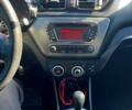 Серый Киа Рио, объемом двигателя 1.4 л и пробегом 75 тыс. км за 9100 $, фото 8 на Automoto.ua