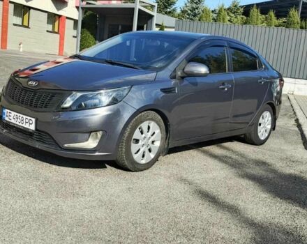 Серый Киа Рио, объемом двигателя 1.6 л и пробегом 177 тыс. км за 6904 $, фото 2 на Automoto.ua