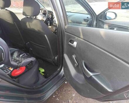Серый Киа Рио, объемом двигателя 1.4 л и пробегом 70 тыс. км за 9000 $, фото 21 на Automoto.ua