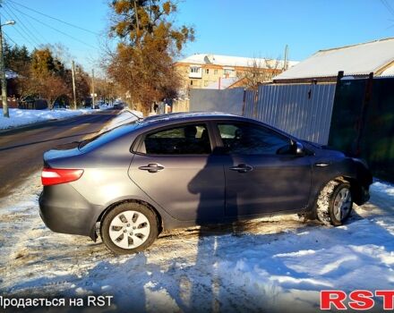 Серый Киа Рио, объемом двигателя 1.4 л и пробегом 24500 тыс. км за 5500 $, фото 2 на Automoto.ua