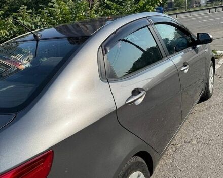Сірий Кіа Ріо, об'ємом двигуна 1.4 л та пробігом 131 тис. км за 7400 $, фото 5 на Automoto.ua
