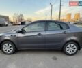 Серый Киа Рио, объемом двигателя 1.4 л и пробегом 103 тыс. км за 9000 $, фото 2 на Automoto.ua