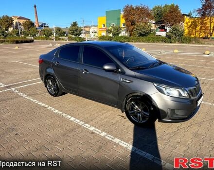 Серый Киа Рио, объемом двигателя 1.4 л и пробегом 75 тыс. км за 9100 $, фото 2 на Automoto.ua