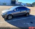 Серый Киа Рио, объемом двигателя 1.4 л и пробегом 75 тыс. км за 9100 $, фото 1 на Automoto.ua