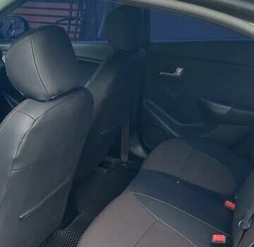 Серый Киа Рио, объемом двигателя 1.4 л и пробегом 150 тыс. км за 8600 $, фото 14 на Automoto.ua