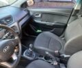 Серый Киа Рио, объемом двигателя 1.4 л и пробегом 53 тыс. км за 8300 $, фото 3 на Automoto.ua