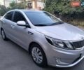 Серый Киа Рио, объемом двигателя 1.59 л и пробегом 253 тыс. км за 7999 $, фото 1 на Automoto.ua