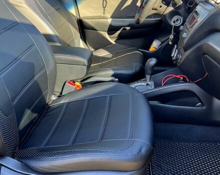Серый Киа Рио, объемом двигателя 1.4 л и пробегом 75 тыс. км за 9100 $, фото 4 на Automoto.ua