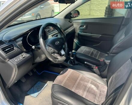 Сірий Кіа Ріо, об'ємом двигуна 1.6 л та пробігом 232 тис. км за 7699 $, фото 14 на Automoto.ua