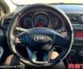 Серый Киа Рио, объемом двигателя 1.4 л и пробегом 75 тыс. км за 9100 $, фото 7 на Automoto.ua