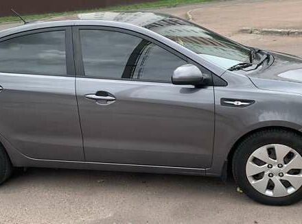 Серый Киа Рио, объемом двигателя 1.4 л и пробегом 188 тыс. км за 8600 $, фото 1 на Automoto.ua