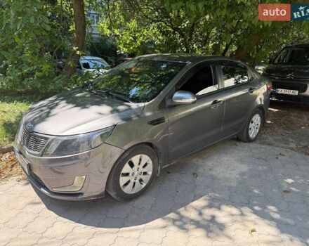 Серый Киа Рио, объемом двигателя 1.59 л и пробегом 258 тыс. км за 5600 $, фото 3 на Automoto.ua