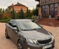 Серый Киа Рио, объемом двигателя 1.4 л и пробегом 91 тыс. км за 8450 $, фото 1 на Automoto.ua