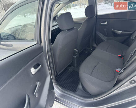 Серый Киа Рио, объемом двигателя 1.4 л и пробегом 260 тыс. км за 7799 $, фото 18 на Automoto.ua