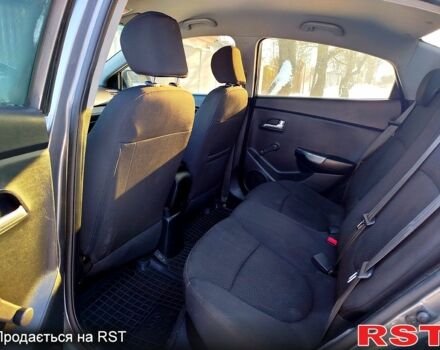 Серый Киа Рио, объемом двигателя 1.4 л и пробегом 24500 тыс. км за 5500 $, фото 8 на Automoto.ua