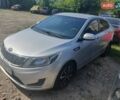 Серый Киа Рио, объемом двигателя 1.4 л и пробегом 145 тыс. км за 8227 $, фото 1 на Automoto.ua