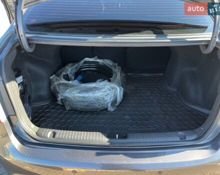 Серый Киа Рио, объемом двигателя 1.4 л и пробегом 73 тыс. км за 8800 $, фото 7 на Automoto.ua