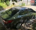 Серый Киа Рио, объемом двигателя 1.59 л и пробегом 258 тыс. км за 5600 $, фото 1 на Automoto.ua