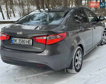Серый Киа Рио, объемом двигателя 1.4 л и пробегом 260 тыс. км за 7799 $, фото 2 на Automoto.ua