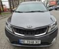 Серый Киа Рио, объемом двигателя 1.4 л и пробегом 250 тыс. км за 7400 $, фото 1 на Automoto.ua