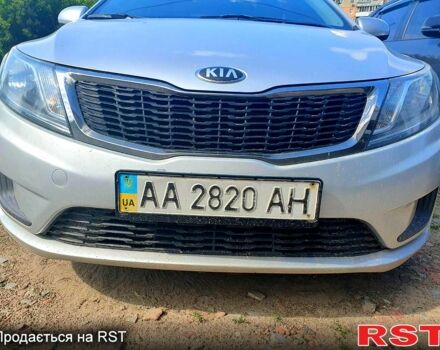 Серый Киа Рио, объемом двигателя 1.4 л и пробегом 145 тыс. км за 8210 $, фото 5 на Automoto.ua