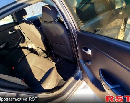 Серый Киа Рио, объемом двигателя 1.4 л и пробегом 24500 тыс. км за 5500 $, фото 6 на Automoto.ua