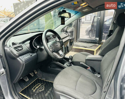 Серый Киа Рио, объемом двигателя 1.4 л и пробегом 245 тыс. км за 5900 $, фото 12 на Automoto.ua