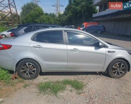 Серый Киа Рио, объемом двигателя 1.4 л и пробегом 145 тыс. км за 8227 $, фото 1 на Automoto.ua