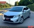 Сірий Кіа Ріо, об'ємом двигуна 1.4 л та пробігом 230 тис. км за 5799 $, фото 1 на Automoto.ua