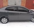 Серый Киа Рио, объемом двигателя 1.4 л и пробегом 169 тыс. км за 7500 $, фото 2 на Automoto.ua