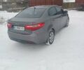 Серый Киа Рио, объемом двигателя 1.4 л и пробегом 300 тыс. км за 5850 $, фото 3 на Automoto.ua