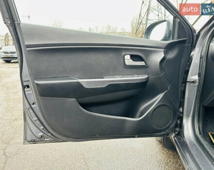 Серый Киа Рио, объемом двигателя 1.4 л и пробегом 245 тыс. км за 5900 $, фото 14 на Automoto.ua