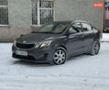 Серый Киа Рио, объемом двигателя 1.4 л и пробегом 260 тыс. км за 7799 $, фото 1 на Automoto.ua