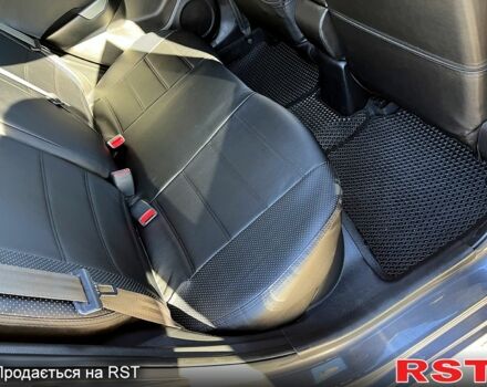 Серый Киа Рио, объемом двигателя 1.4 л и пробегом 75 тыс. км за 9100 $, фото 9 на Automoto.ua