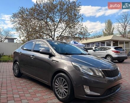 Серый Киа Рио, объемом двигателя 1.4 л и пробегом 231 тыс. км за 7800 $, фото 2 на Automoto.ua