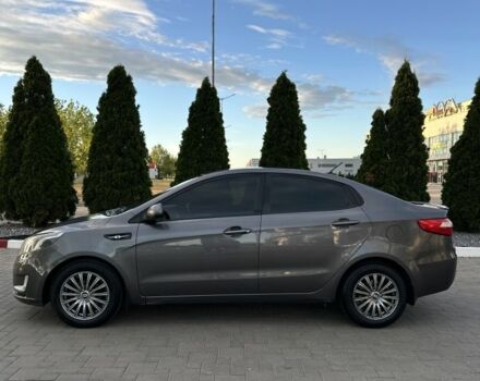 Сірий Кіа Ріо, об'ємом двигуна 1.4 л та пробігом 230 тис. км за 7300 $, фото 4 на Automoto.ua