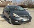 Серый Киа Рио, объемом двигателя 1.6 л и пробегом 128 тыс. км за 9500 $, фото 1 на Automoto.ua