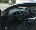 Серый Киа Рио, объемом двигателя 1.4 л и пробегом 20 тыс. км за 12500 $, фото 3 на Automoto.ua